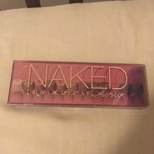 In box swatched once Urban Decay Naked Cherry